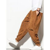Pantalones de hombre de pana en color sólido con cintura media ajustable con cordón y puños elásticos