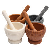 Set de mortero y maja de resina para mezclar y triturar ajo, hierbas y especias en un recipiente de cocina.