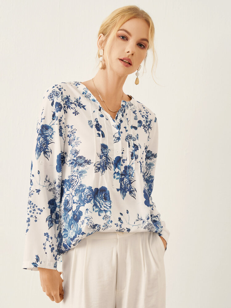 Geplooide blouse met lange mouwen en ronde hals met bloemenprint