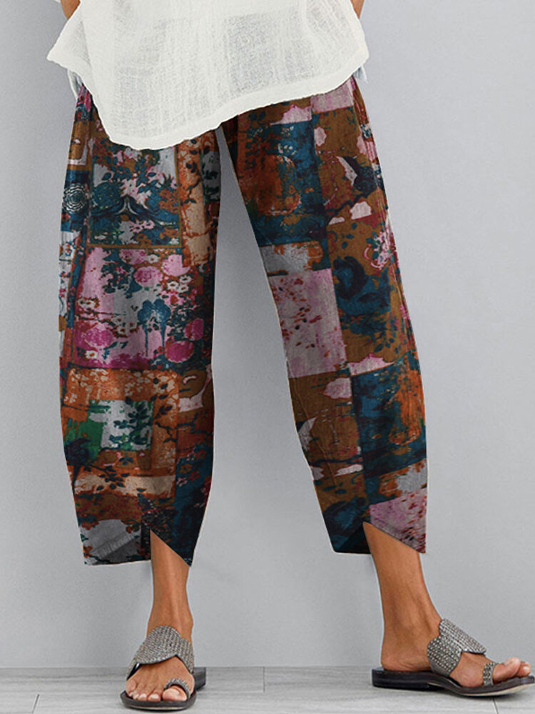 Bloemenprint elastische Wasit losse broek met onregelmatige zoom voor dames