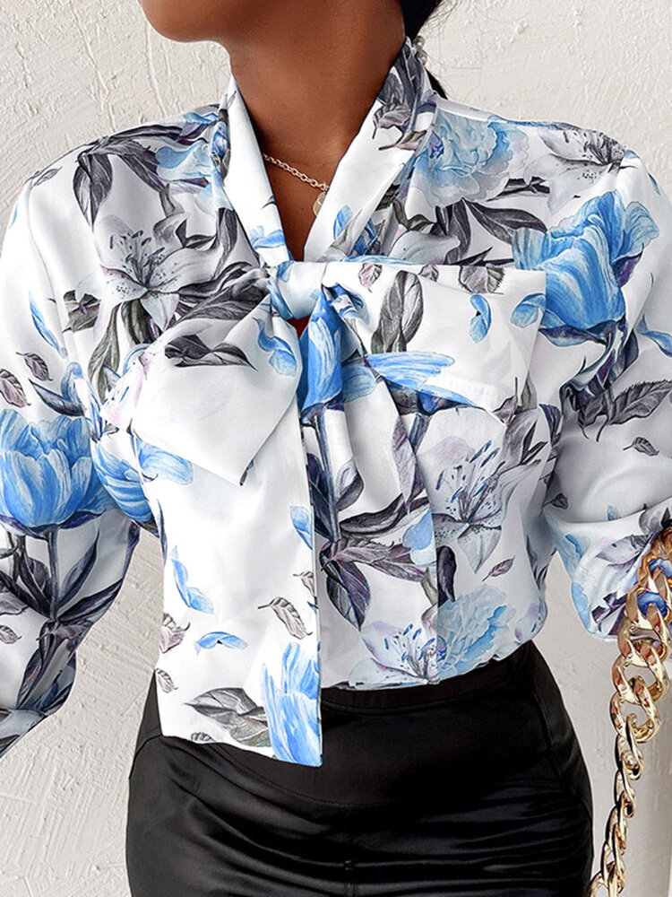 Strikkraag en bloemenprint blouse met vlinderknoop en lange mouwen
