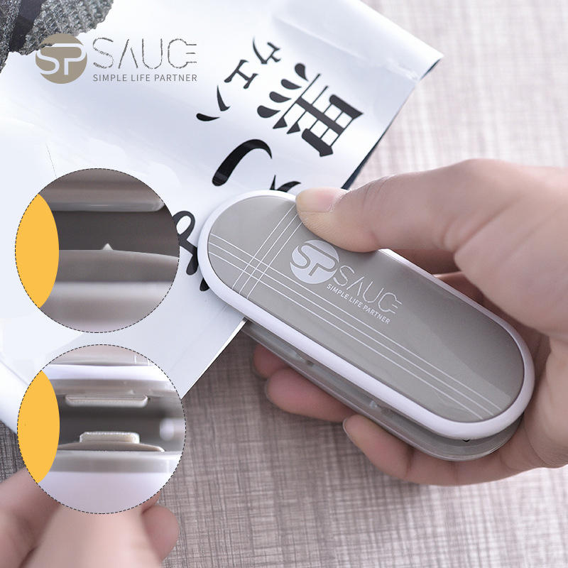 SP Saus Huishoudelijke handdruk Mini Portable Food Vacuumsealer Plastic zak Snijmachine Eenvoudig in